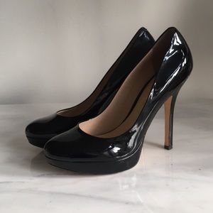 Joan & David DVFLIPP black patent pumps